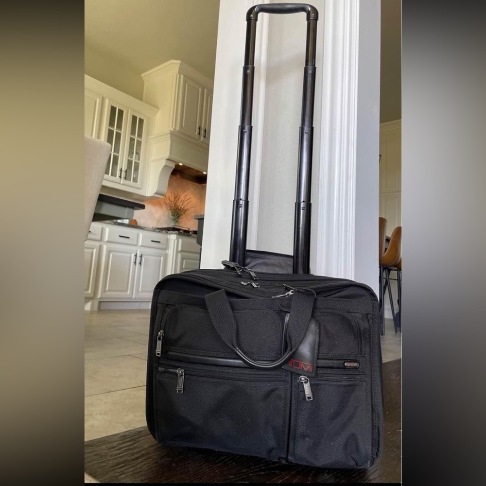 TUMI, Alpha rolling briefcase. 🧳. Pre loved, black briefcase.